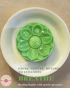 Green ritual candle on white plate for calming and grounding – Canace Dharma
